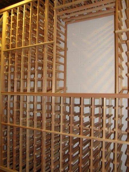 Large traditional wine cellar in Minneapolis with storage racks.