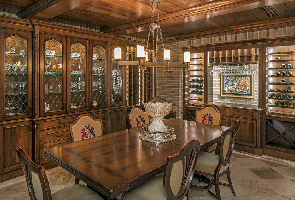 This is an example of a classic wine cellar in Omaha with grey floors.