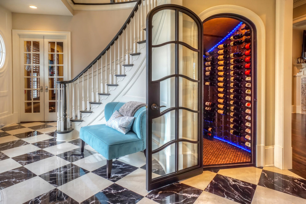 Mid-sized trendy ceramic tile and multicolored floor wine cellar photo in Charlotte with storage racks