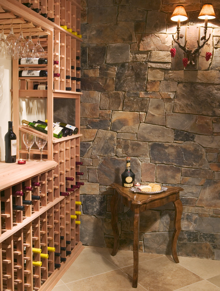 Example of a mountain style wine cellar design in Minneapolis with storage racks
