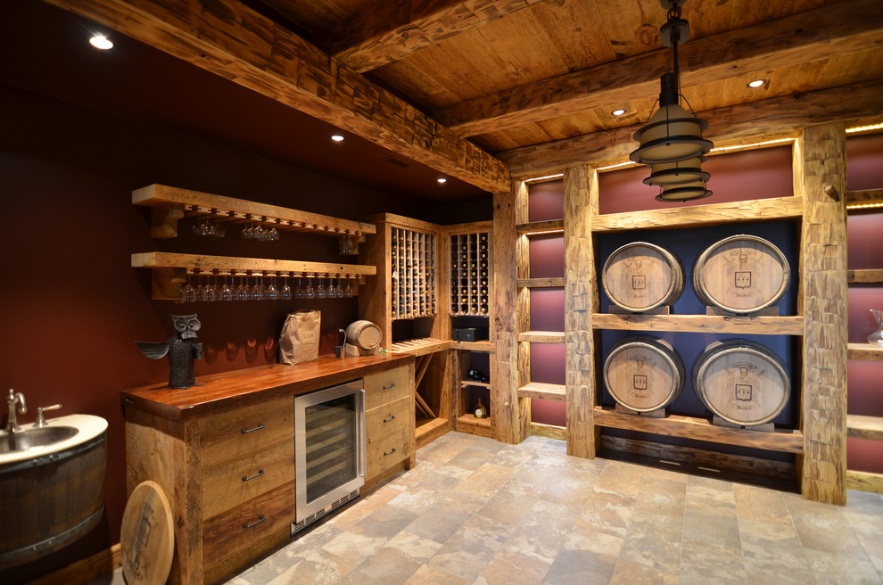 Mountain style wine cellar photo in Toronto