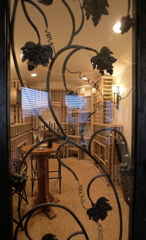 This is an example of a mediterranean wine cellar in Albuquerque.