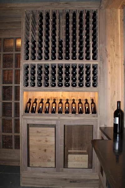 Inspiration for a mediterranean wine cellar in San Francisco with display racks.