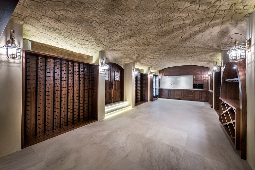 Expansive contemporary wine cellar in Perth with ceramic flooring, display racks and beige floors.