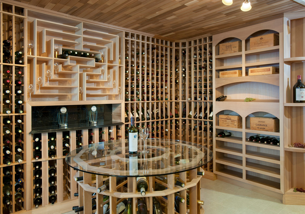 Idée de décoration pour une cave à vin design de taille moyenne avec un sol en linoléum, des casiers et un sol beige.