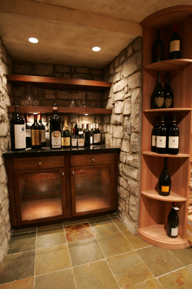 Wine cellar - mediterranean wine cellar idea in Detroit