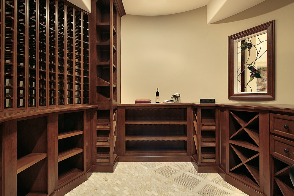 This is an example of a medium sized traditional wine cellar in New York with ceramic flooring, storage racks and beige floors.