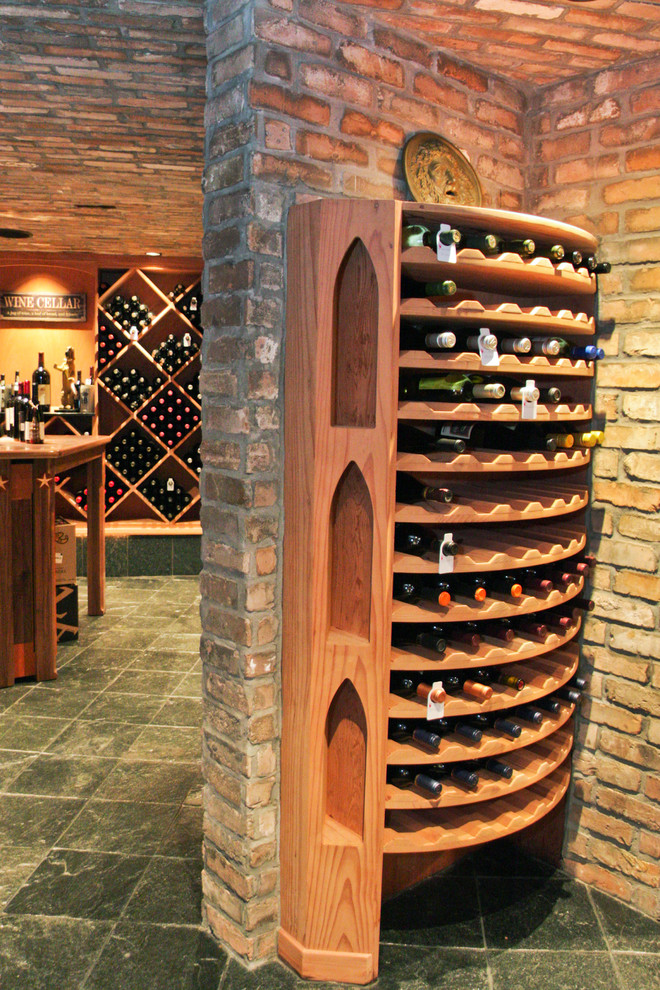 This is an example of a rustic wine cellar in Houston.