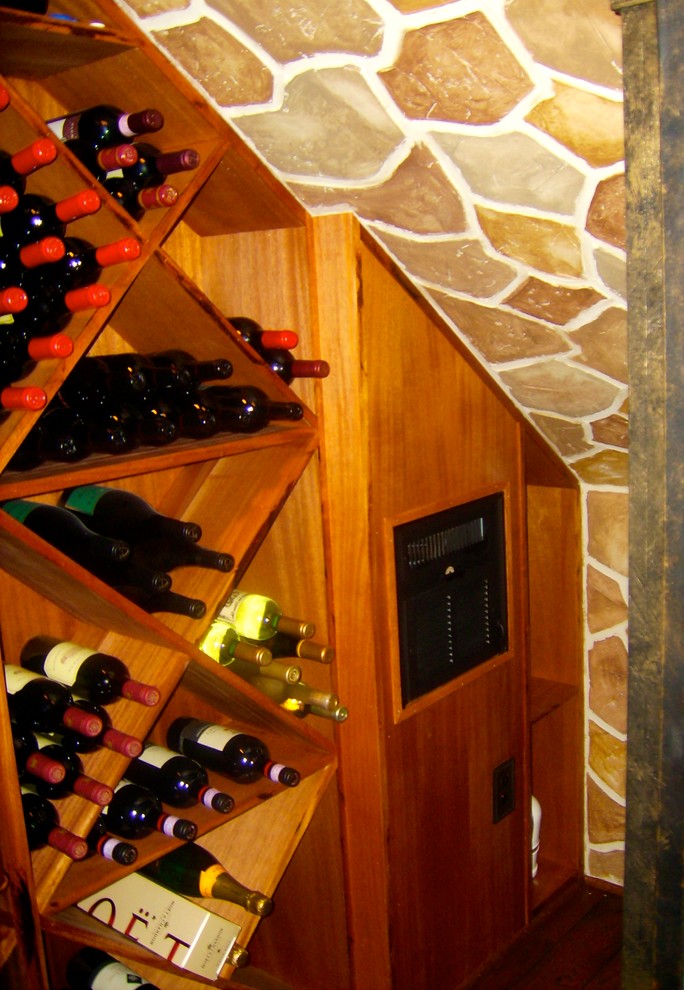 Inspiration for a rustic wine cellar remodel in Houston