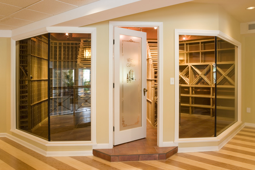 Photo of a large classic wine cellar in Philadelphia with ceramic flooring, cube storage and beige floors.
