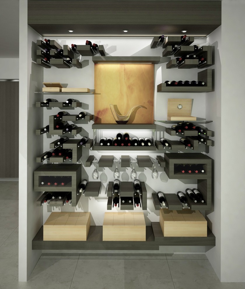 Photo of a small modern wine cellar in Other with display racks.