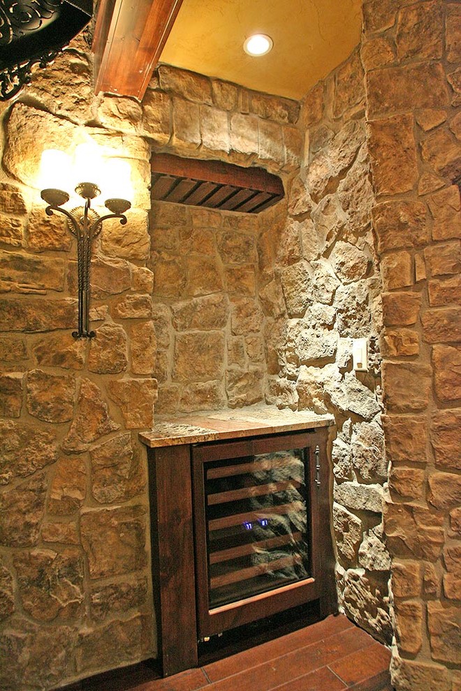 Large traditional wine cellar in Denver.