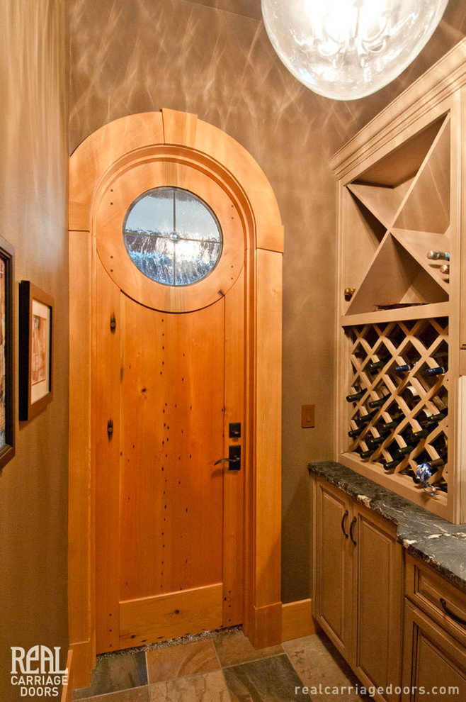 Inspiration for an eclectic wine cellar remodel in Seattle