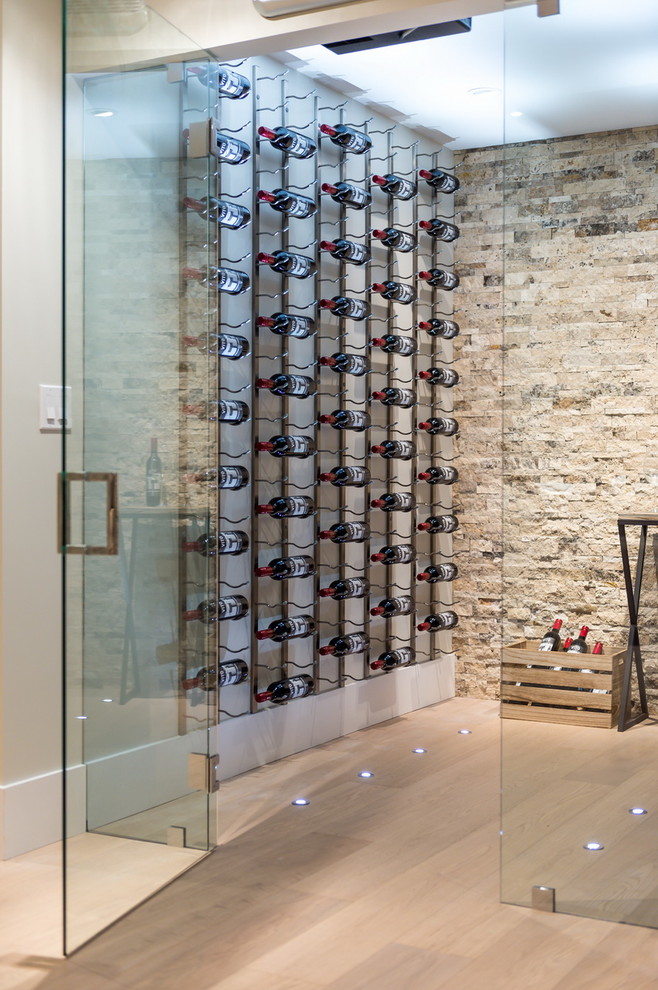 Example of a trendy wine cellar design in Vancouver