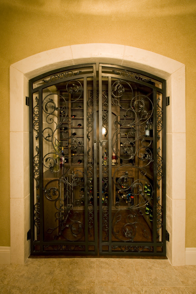 Photo of a mediterranean wine cellar in Austin.