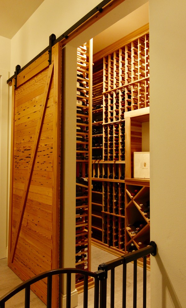 Example of a country wine cellar design in Seattle
