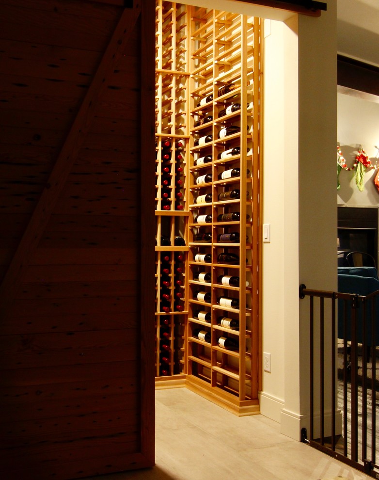 Example of a cottage wine cellar design in Seattle
