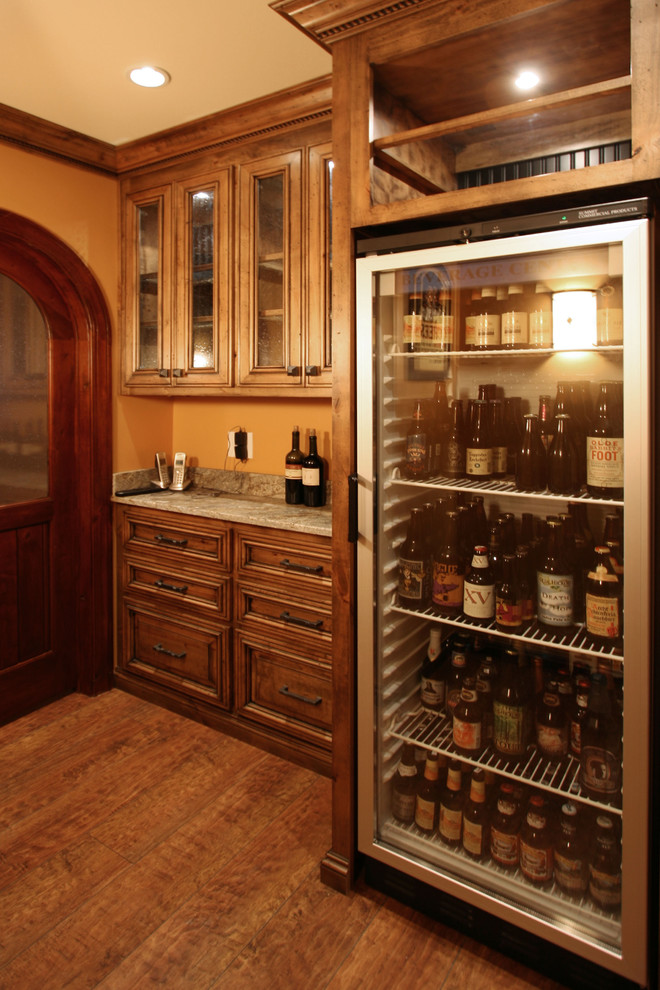 Example of a classic wine cellar design in Charlotte