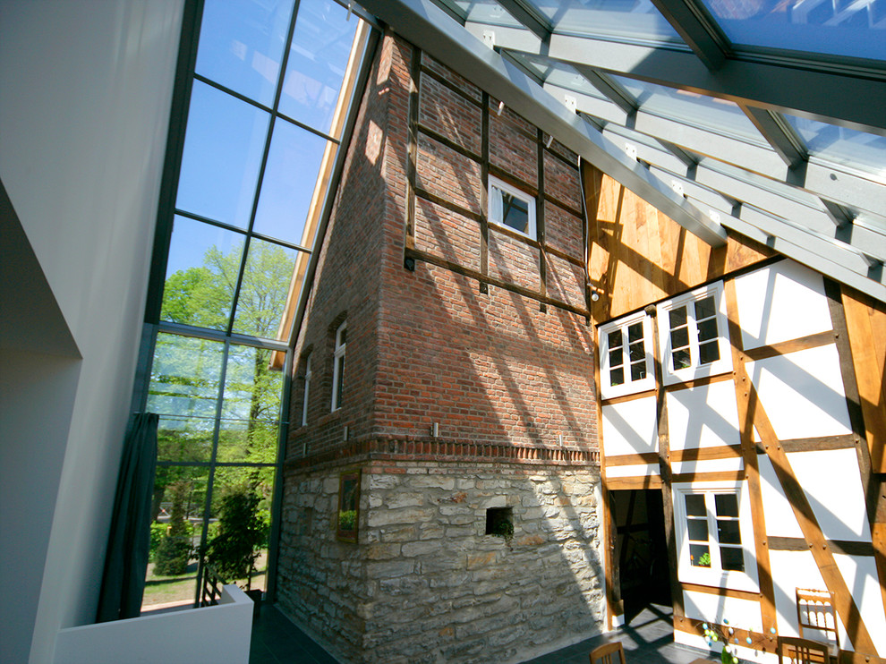Источник вдохновения для домашнего уюта: терраса в стиле кантри с стеклянным потолком