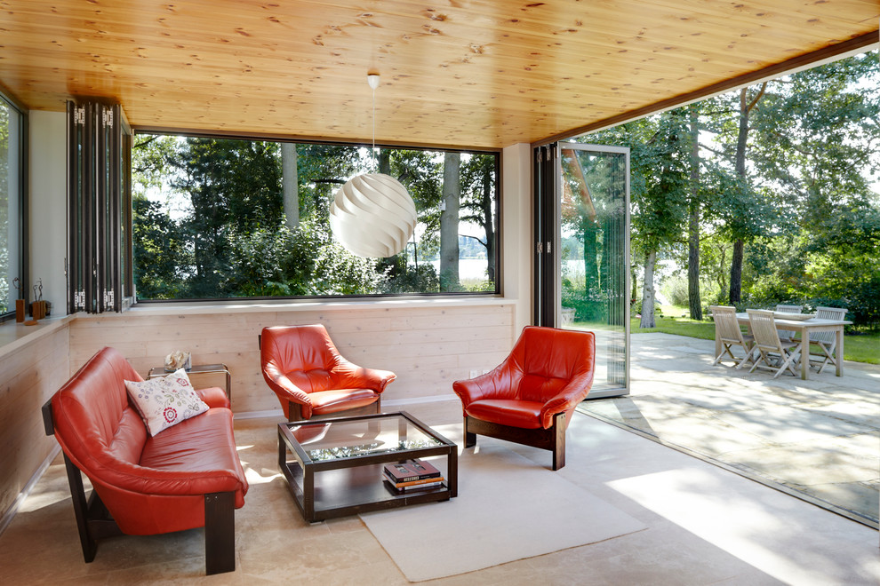 Esempio di una veranda contemporanea di medie dimensioni con soffitto classico e nessun camino