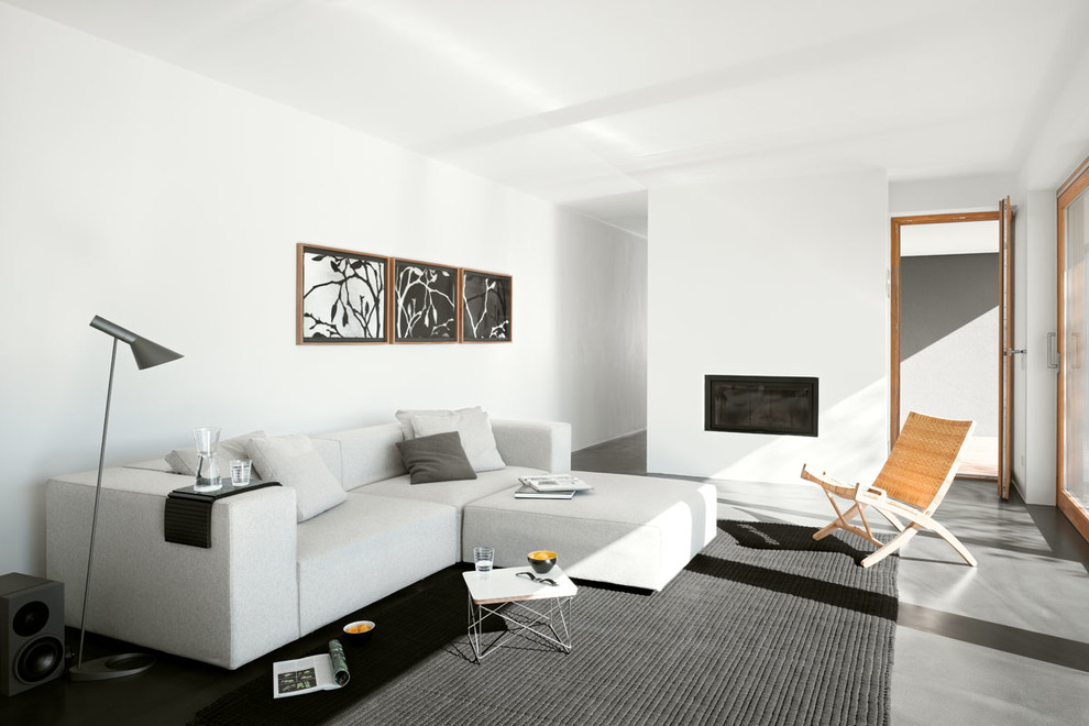 Стильный дизайн: изолированная гостиная комната среднего размера в стиле неоклассика (современная классика) с белыми стенами, стандартным камином и фасадом камина из штукатурки без телевизора - последний тренд