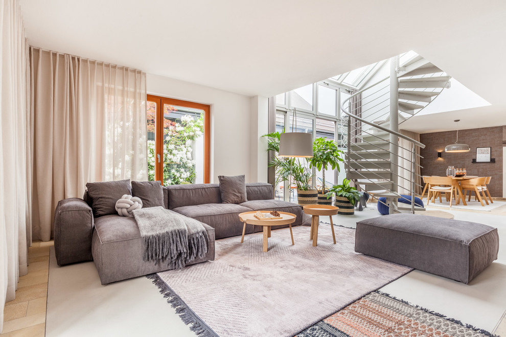 Large contemporary formal open plan living room in Other with white walls, beige floors, no fireplace and no tv.