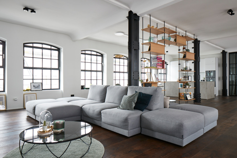 Living room - industrial living room idea in Hamburg