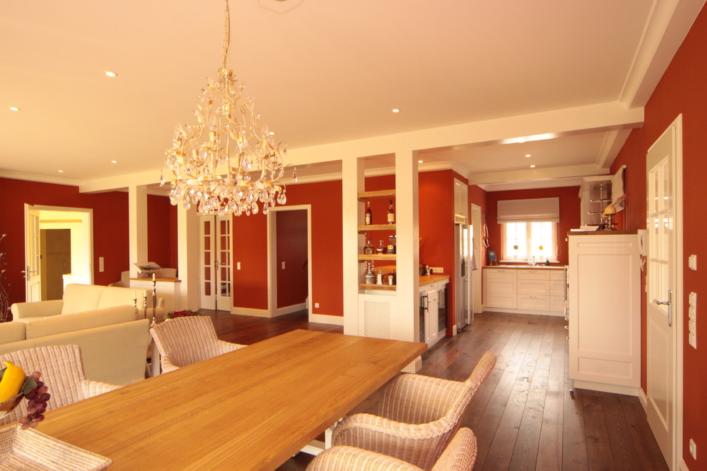 Inspiration for a country living room remodel in Berlin with red walls
