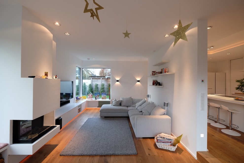 Modelo de sala de estar minimalista con alfombra