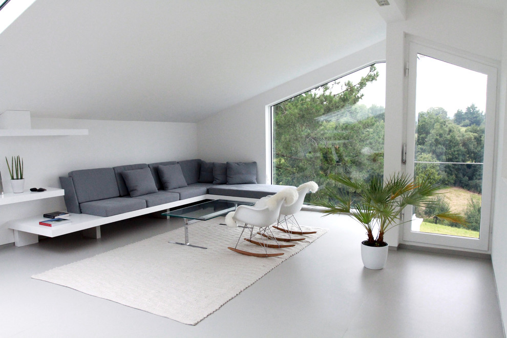 Mid-sized trendy formal and enclosed living room photo in Stuttgart with white walls, no fireplace and no tv