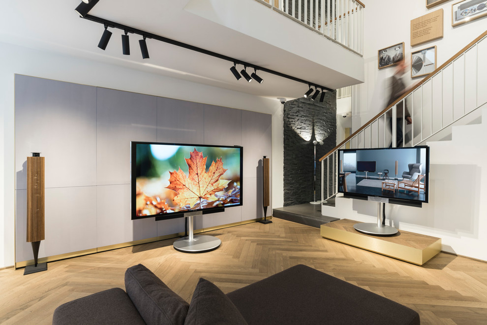 Réalisation d'une salle de séjour design avec un téléviseur indépendant.