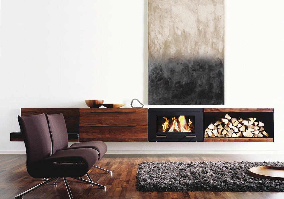 Inspiration for a mid-sized modern open concept dark wood floor living room remodel in Other with a hanging fireplace, white walls and a metal fireplace