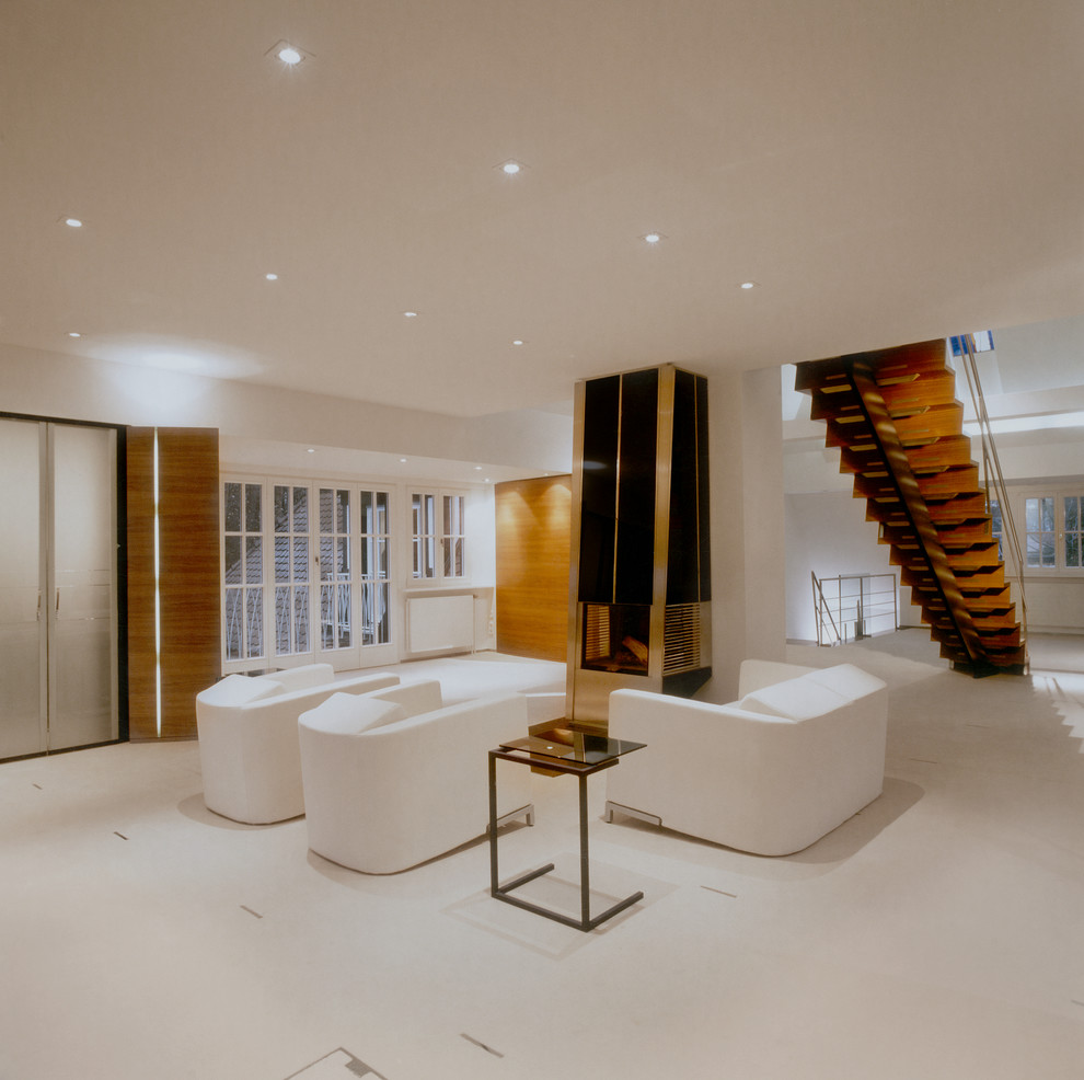 Idee per un grande soggiorno design aperto con sala formale, pareti bianche, cornice del camino in metallo, camino classico e nessuna TV