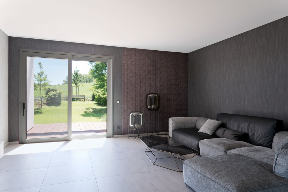 Идея дизайна: большая гостиная комната в стиле модернизм с серыми стенами и бетонным полом