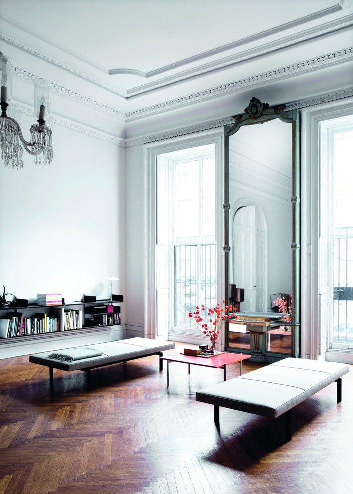 Inspiration for a large eclectic formal and enclosed dark wood floor living room remodel in Munich with white walls