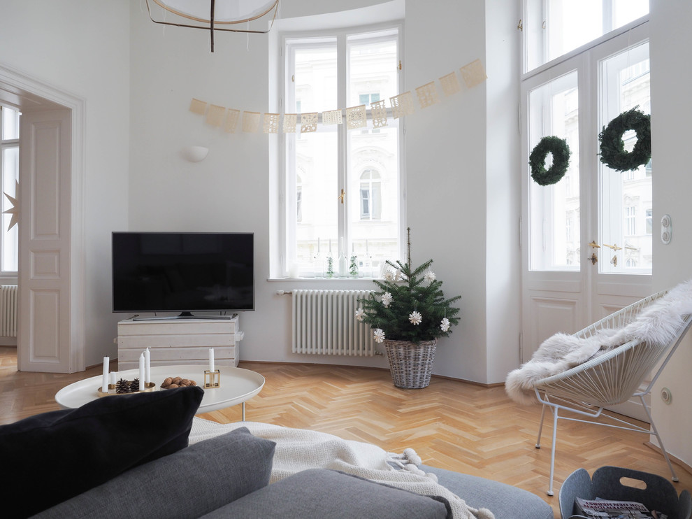 This is an example of a scandinavian living room in Other.
