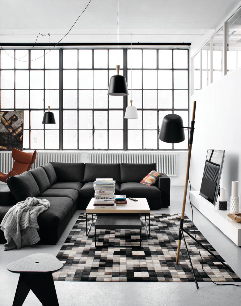 Offenes, Mittelgroßes Modernes Wohnzimmer ohne Kamin mit weißer Wandfarbe und freistehendem TV in Düsseldorf