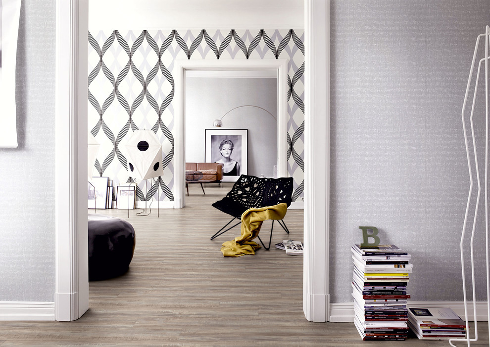 Contemporary living room in Cologne with vinyl flooring.
