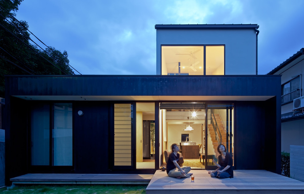 Idee per una terrazza minimalista di medie dimensioni e dietro casa con nessuna copertura