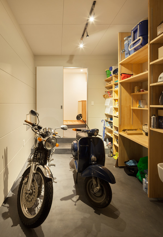 Immagine di piccoli garage e rimesse connessi scandinavi