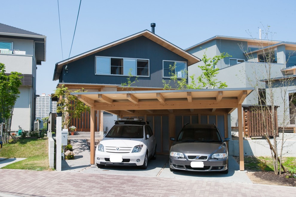 Carport - transitional detached two-car carport idea in Kobe