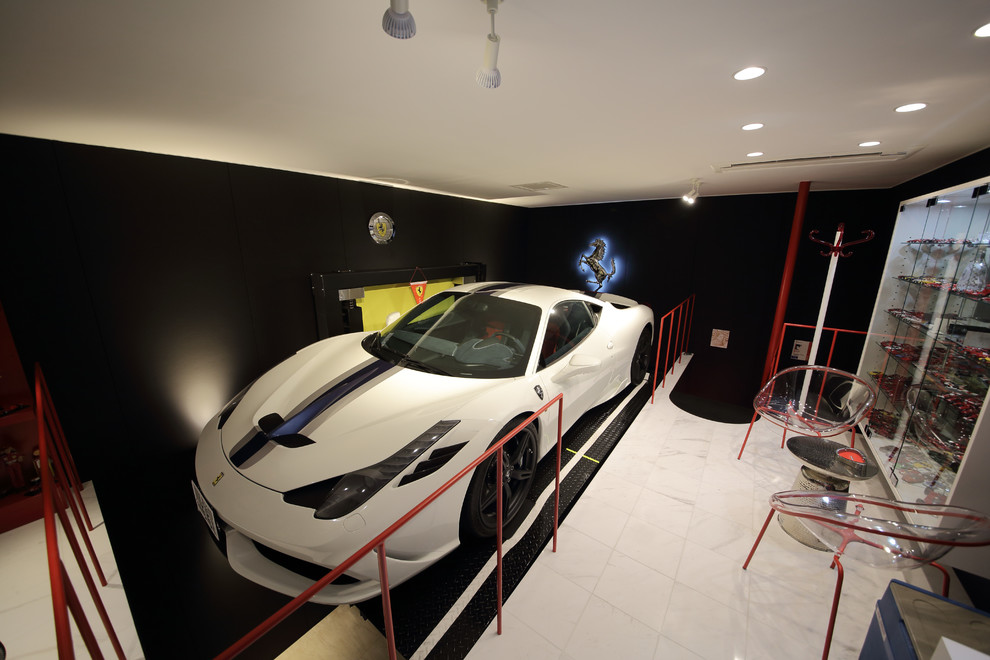 Idée de décoration pour un grand garage pour deux voitures design.