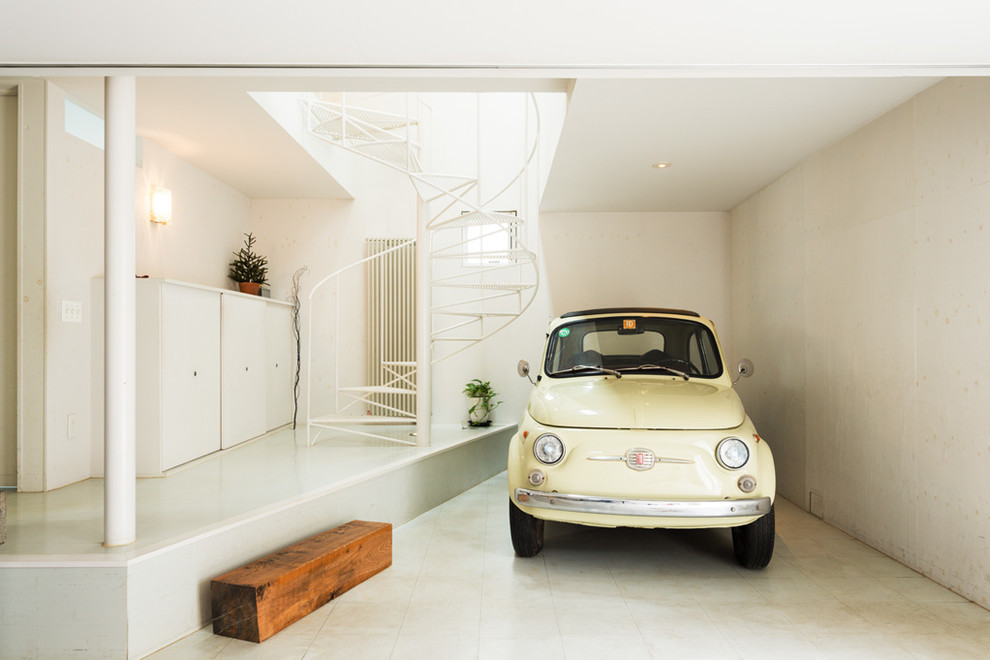 Пример оригинального дизайна: пристроенный гараж в современном стиле для одной машины