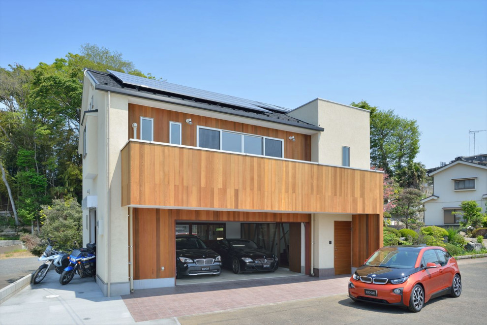 Cette image montre un grand garage pour deux voitures séparé minimaliste.