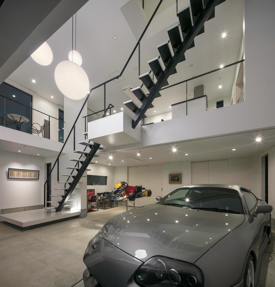 Свежая идея для дизайна: гараж в стиле модернизм - отличное фото интерьера