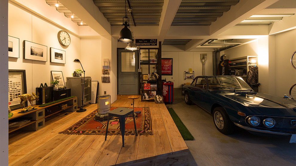 Inspiration pour un garage pour une voiture urbain.