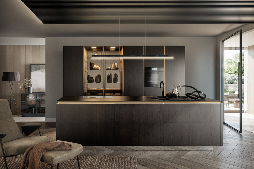 Offene, Zweizeilige Moderne Küche mit flächenbündigen Schrankfronten, dunklen Holzschränken, Küchenrückwand in Braun, Kücheninsel und grauer Arbeitsplatte in Tokio