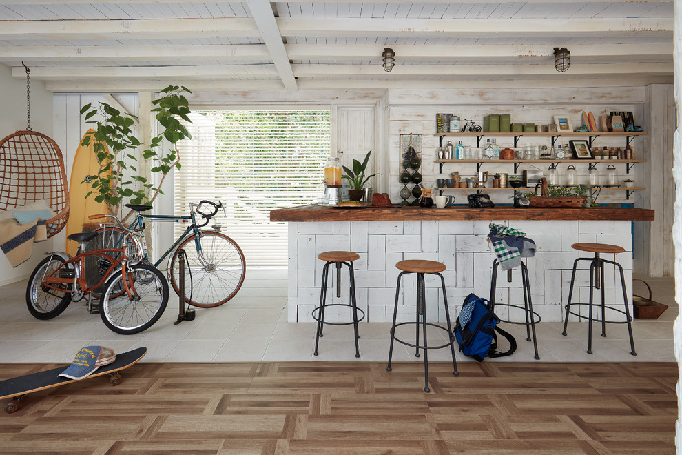 Design ideas for an urban kitchen in Tokyo with painted wood flooring and brown floors.