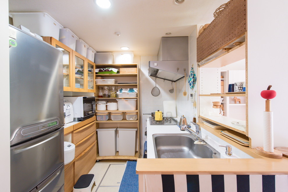 東京23区にあるアジアンスタイルのおしゃれなキッチンの写真
