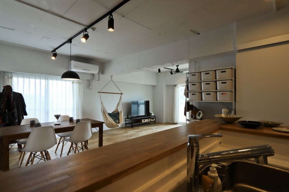 Example of a mid-sized trendy single-wall medium tone wood floor and beige floor open concept kitchen design in Tokyo Suburbs with an undermount sink, open cabinets, medium tone wood cabinets, wood countertops, white backsplash, glass sheet backsplash, white appliances, an island and white countertops